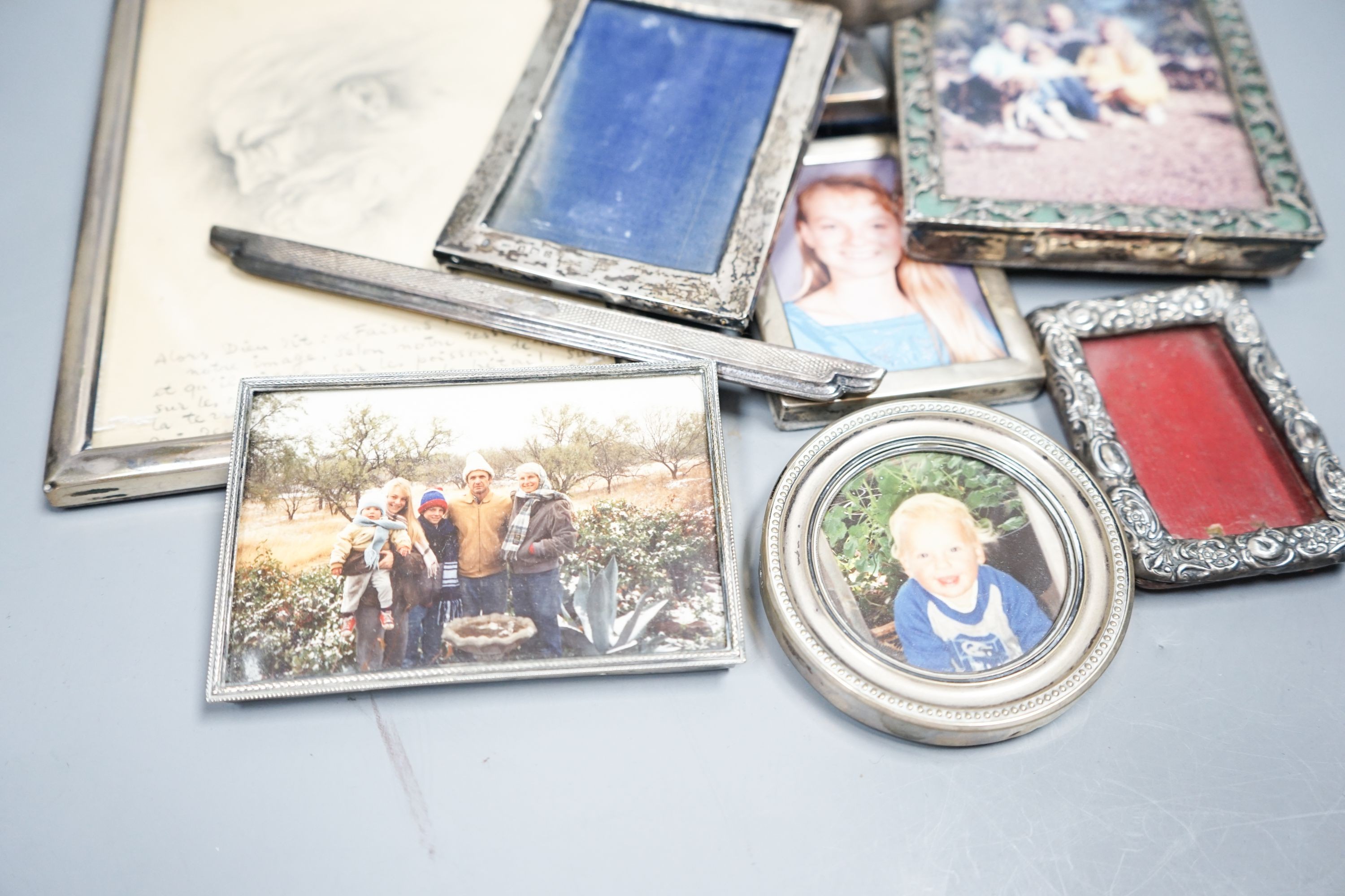 Various silver mounted photograph frames and a silver bangle